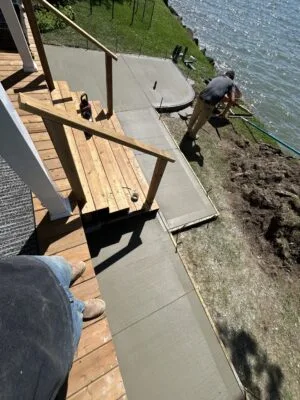 Large excavation site in Windsor prepared with a gravel base for concrete or pool foundation.